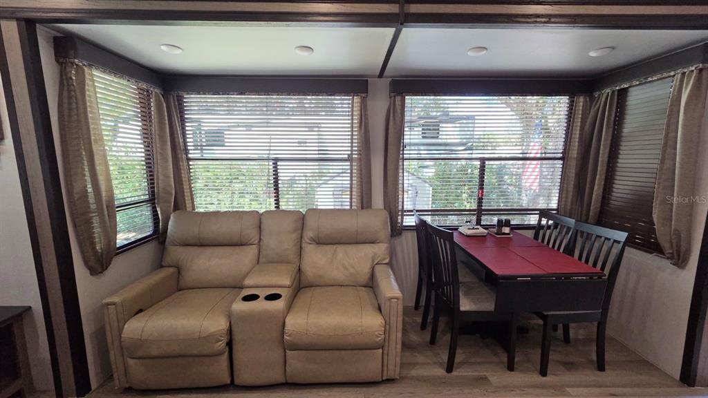 431 Waterway Drive River Ranch, FL 33867 - Photo 15 of 26 a living room with furniture and a large window