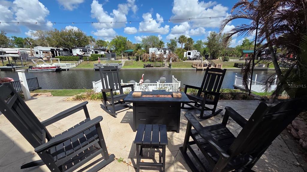 431 Waterway Drive River Ranch, FL 33867 - Photo 2 of 26 a view of a chairs and table in a terrace