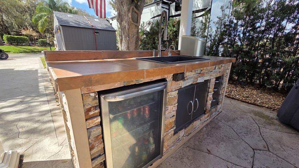 431 Waterway Drive River Ranch, FL 33867 - Photo 4 of 26 a view of a house with a sink and yard