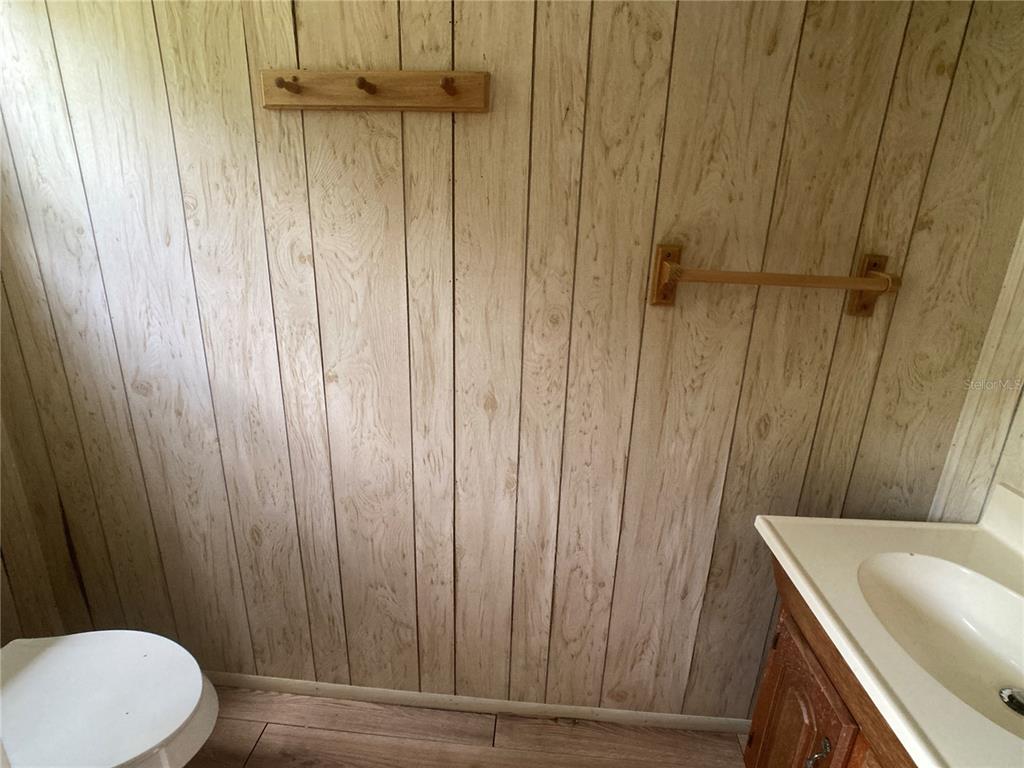 1710 7th Street Southwest, Unit 82 Ruskin, FL 33570 - Photo 17 of 19 a bathroom with a shower and a sink