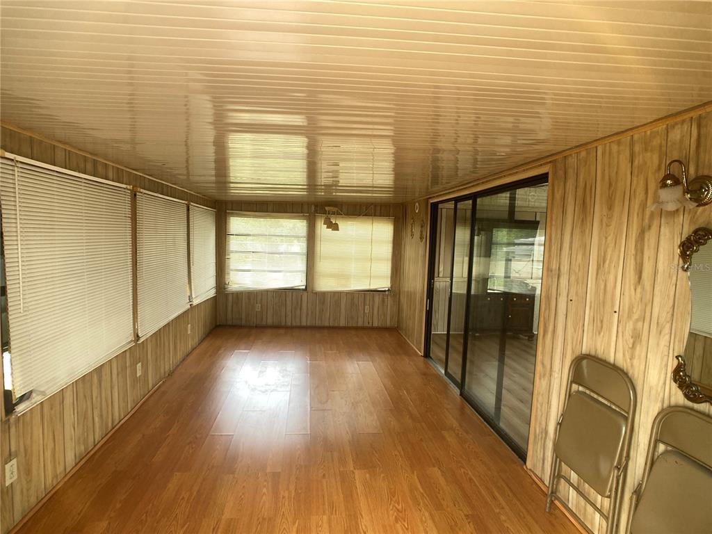 1710 7th Street Southwest, Unit 82 Ruskin, FL 33570 - Photo 9 of 19 a view of entryway with wooden floor