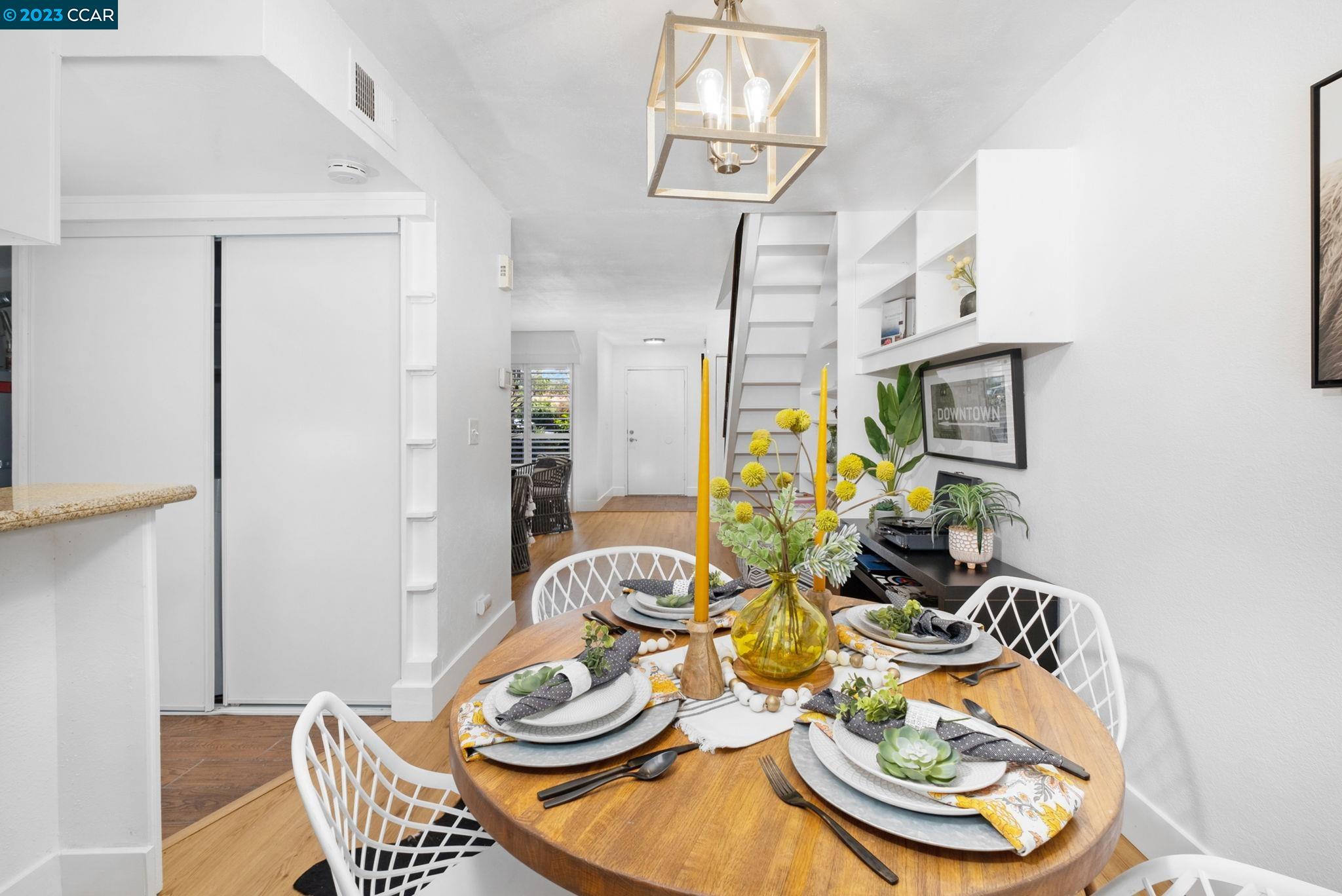 1875 Pomar Way Walnut Creek, CA 94598 - Photo 12 of 32 a dining room with furniture and wooden floor