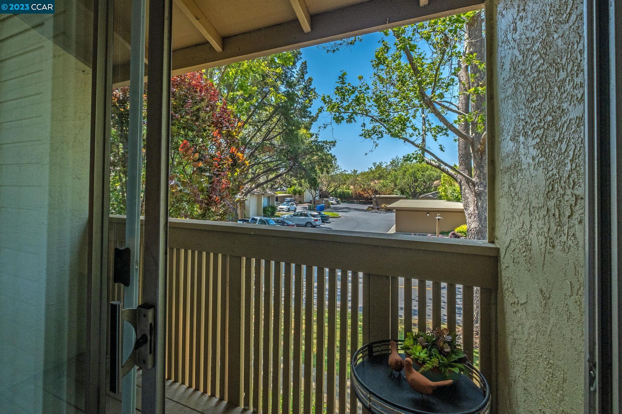 1875 Pomar Way Walnut Creek, CA 94598 - Photo 21 of 32 a side view of a balcony with wooden floor