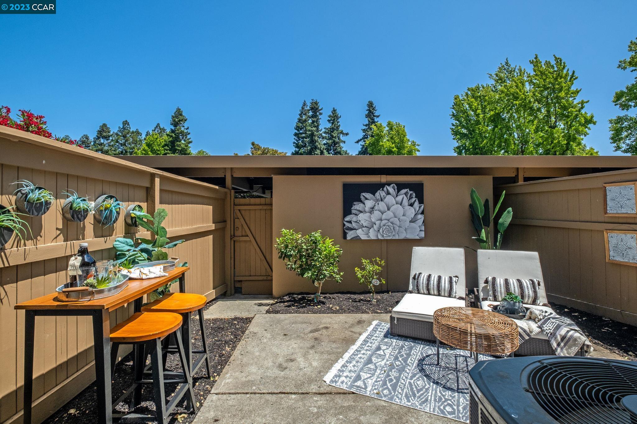 1875 Pomar Way Walnut Creek, CA 94598 - Photo 25 of 32 a outdoor living space with furniture and a potted plant