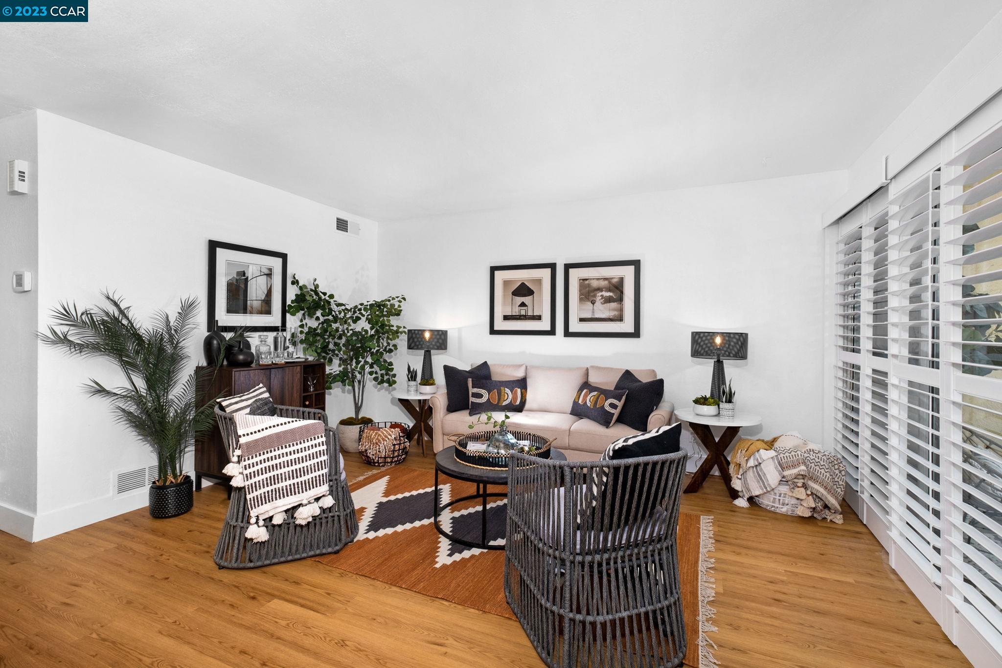 1875 Pomar Way Walnut Creek, CA 94598 - Photo 5 of 32 a living room with furniture and a wooden floor