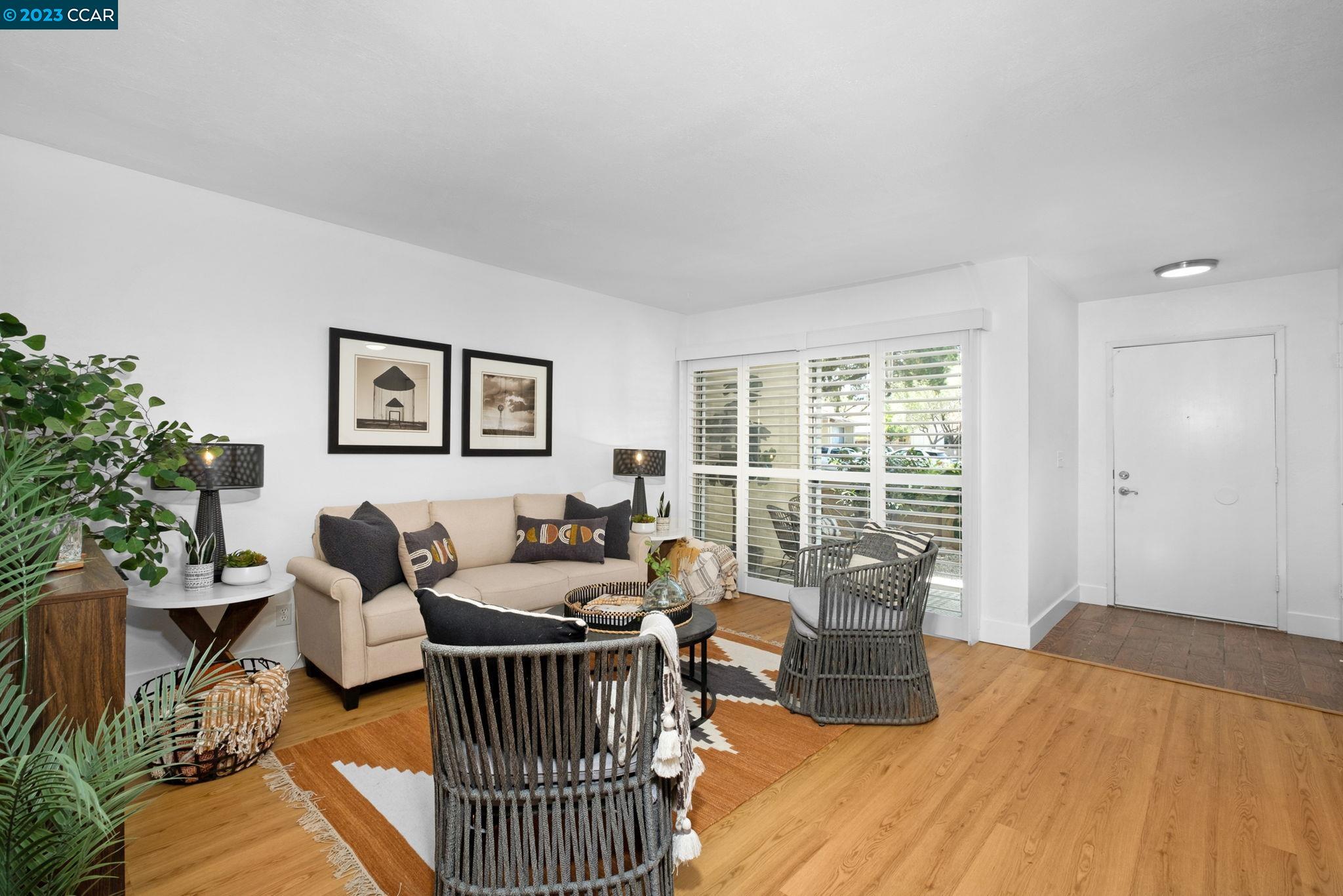 1875 Pomar Way Walnut Creek, CA 94598 - Photo 6 of 32 a living room with furniture and wooden floor