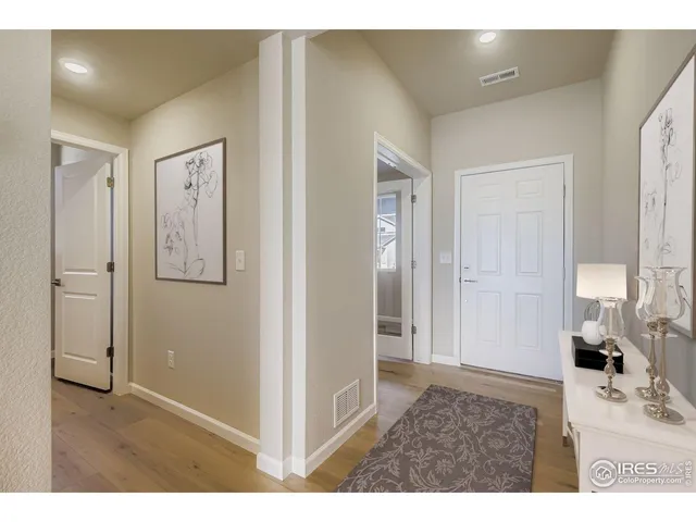 a red brick building with red door