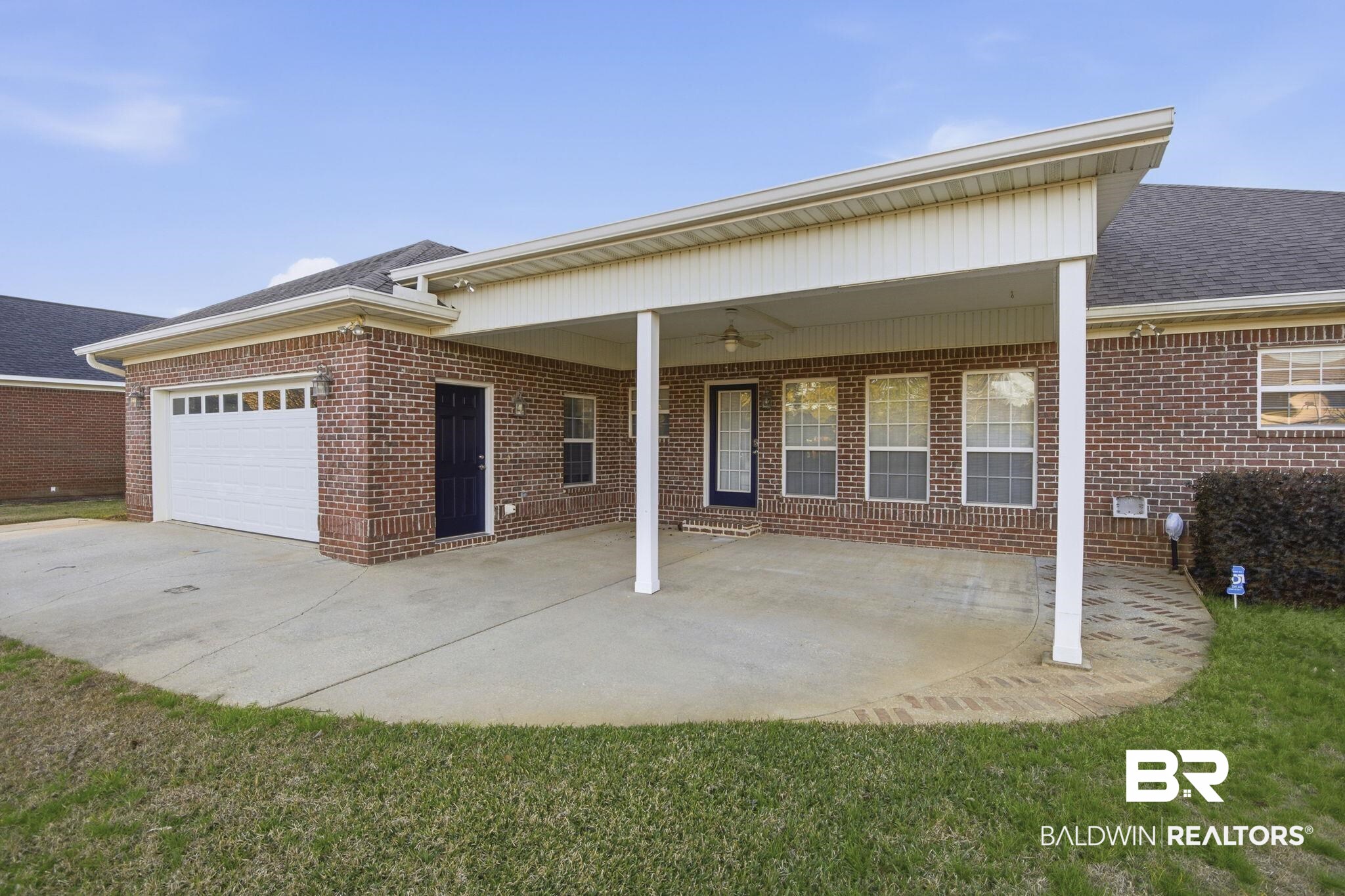 29634 St George Street Daphne, AL 36526 - Photo 8 of 47 Rear view of house with a patio, brick siding, a ceiling fan, and an attached garage