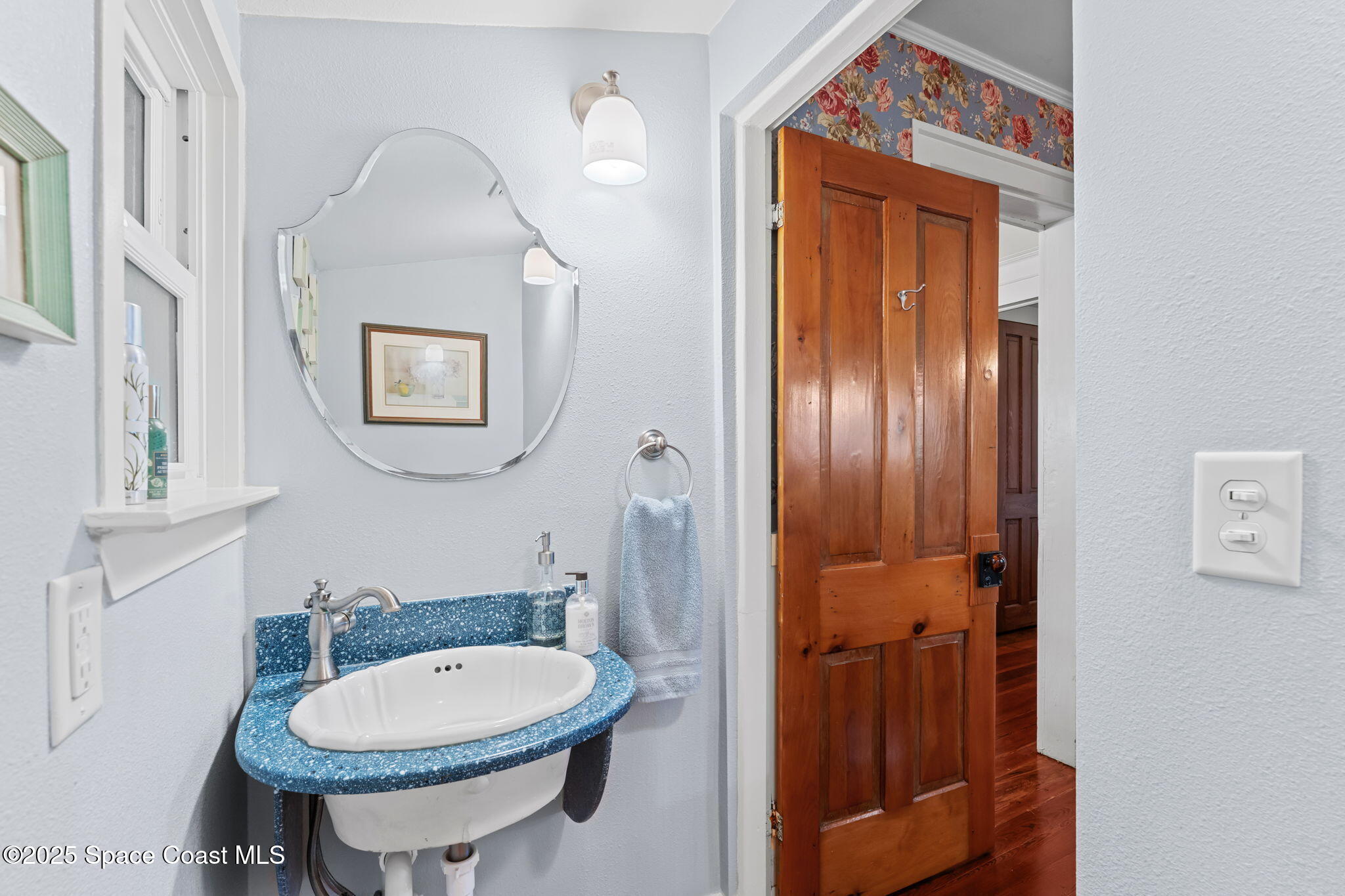 27 Barton Avenue Rockledge, FL 32955 - Photo 31 of 85 half bath off dining