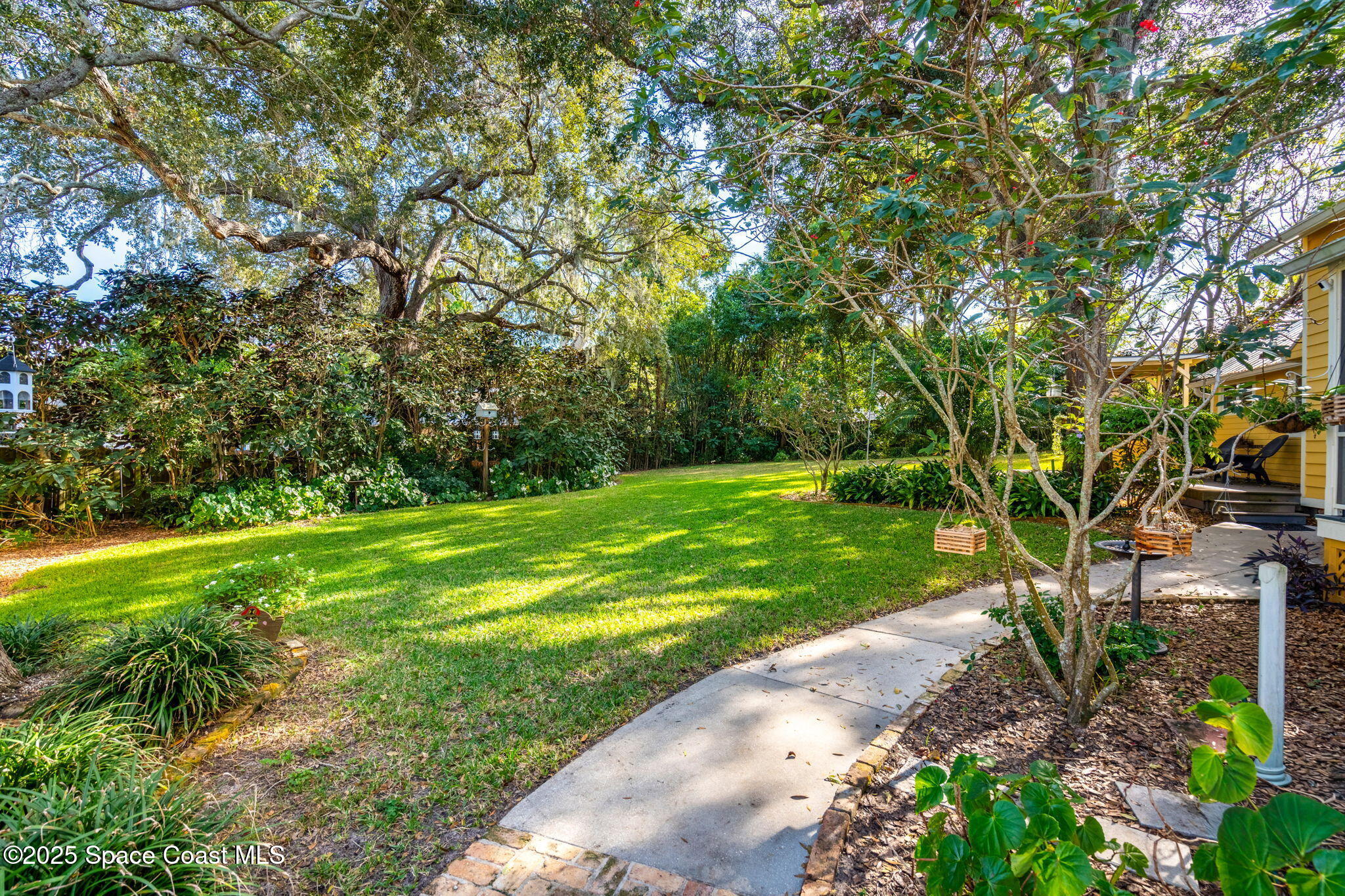 27 Barton Avenue Rockledge, FL 32955 - Photo 77 of 85 side yard 3
