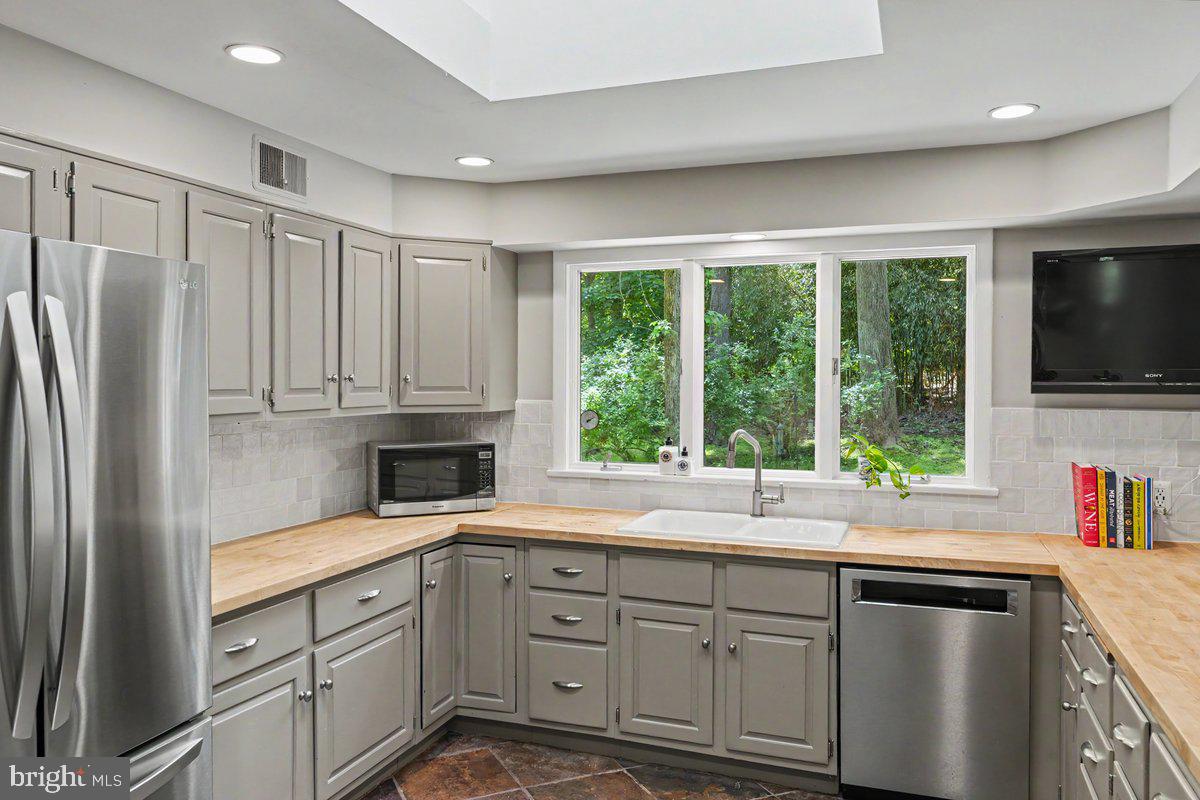 13 High Road New Hope, PA 18938 - Photo 11 of 56 a kitchen with granite countertop a refrigerator and a sink