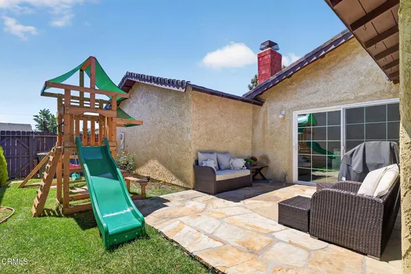 a house view with a backyard space