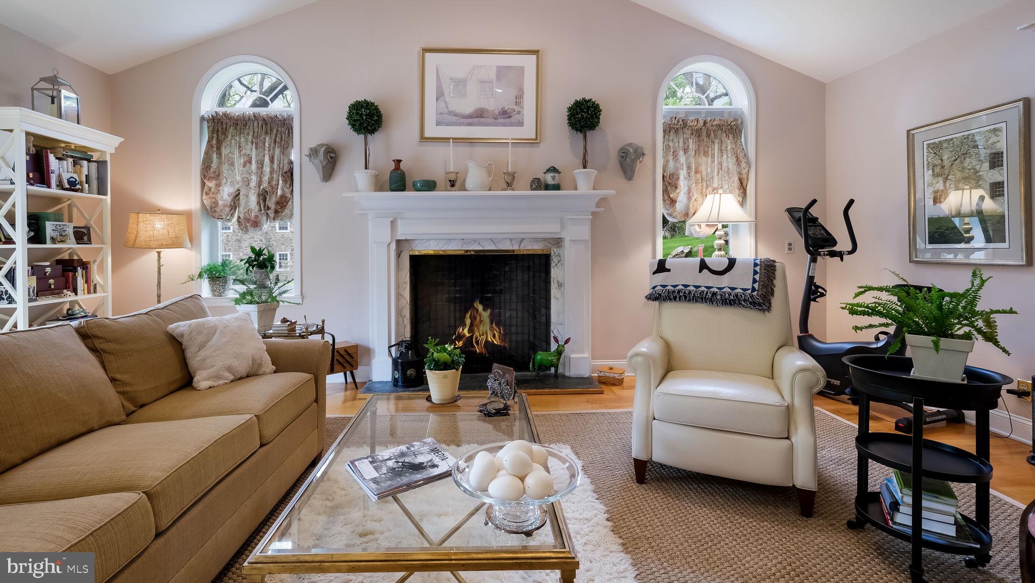 235 Painter Road Media, PA 19063 - Photo 17 of 59 Wood burning fireplace in living room