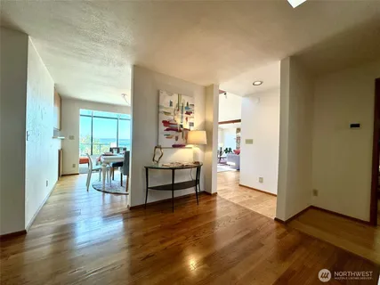 a living room with furniture and a table