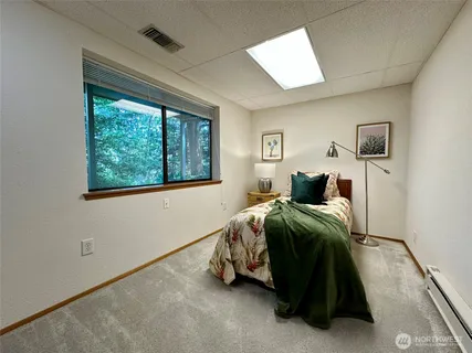 a view of a workspace with furniture