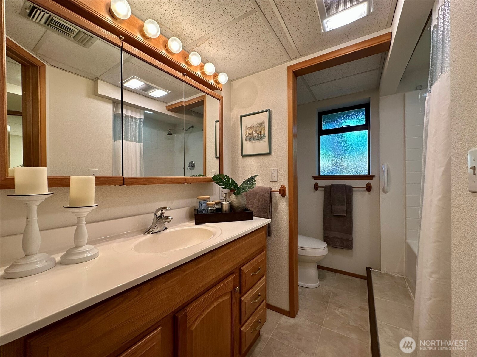 714 Southwest 296th Street Federal Way, WA 98023 - Photo 31 of 40 a bathroom with a sink double vanity and a mirror
