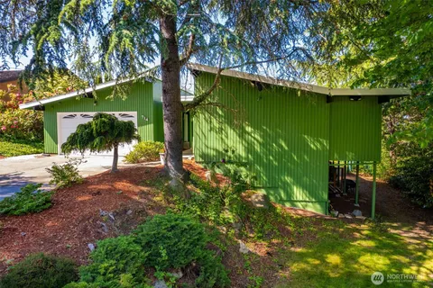 a view of swimming pool with an outdoor space and seating area