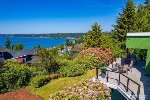 a view of a chairs and table on the terrace
