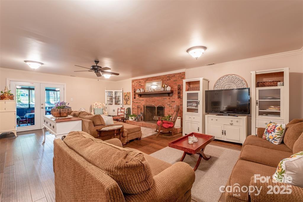 4805 Nesbit Road Monroe, NC 28112 - Photo 14 of 40 a living room with fireplace furniture and a flat screen tv
