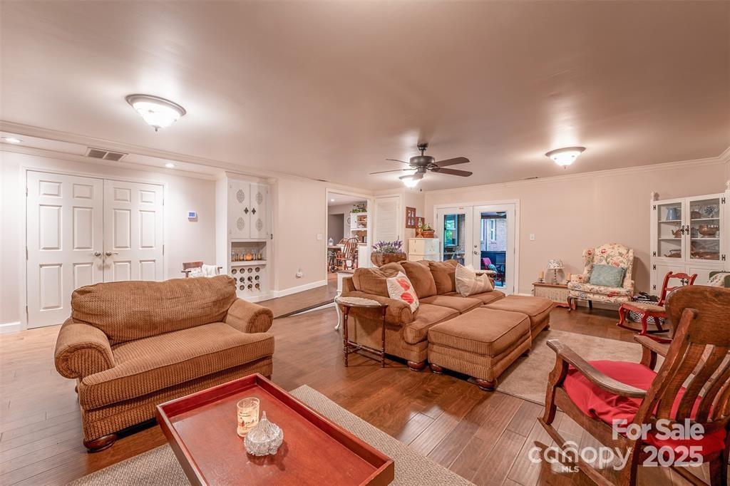 4805 Nesbit Road Monroe, NC 28112 - Photo 16 of 40 a living room with furniture ceiling fan and a rug