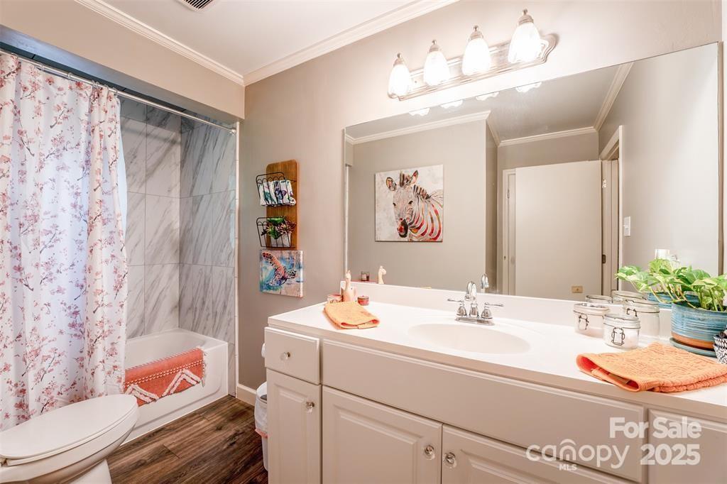 4805 Nesbit Road Monroe, NC 28112 - Photo 26 of 40 a bathroom with a sink and a mirror