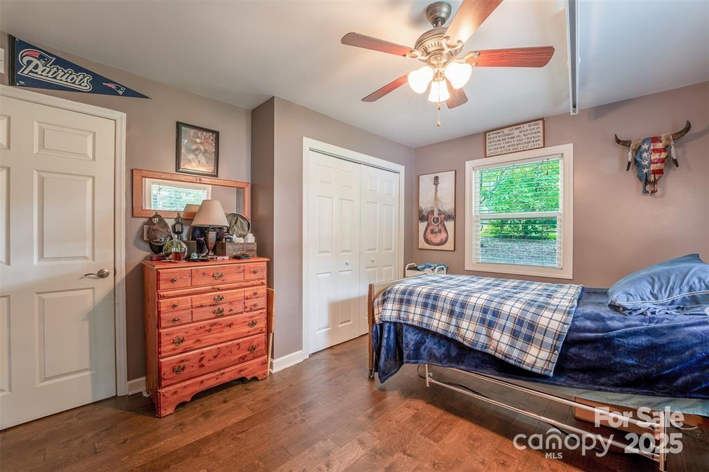 4805 Nesbit Road Monroe, NC 28112 - Photo 30 of 40 a bedroom with a bed and large windows