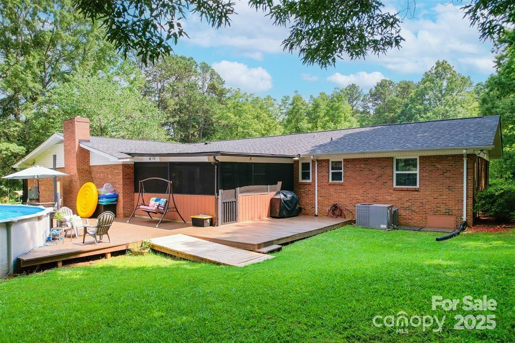4805 Nesbit Road Monroe, NC 28112 - Photo 34 of 40 a front view of house with a garden and patio