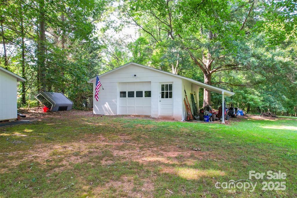 4805 Nesbit Road Monroe, NC 28112 - Photo 37 of 40 a front view of a house with garden