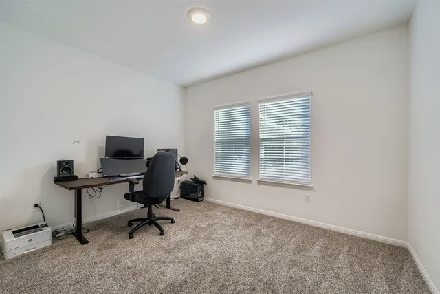 a bathroom with a sink a mirror and a shower