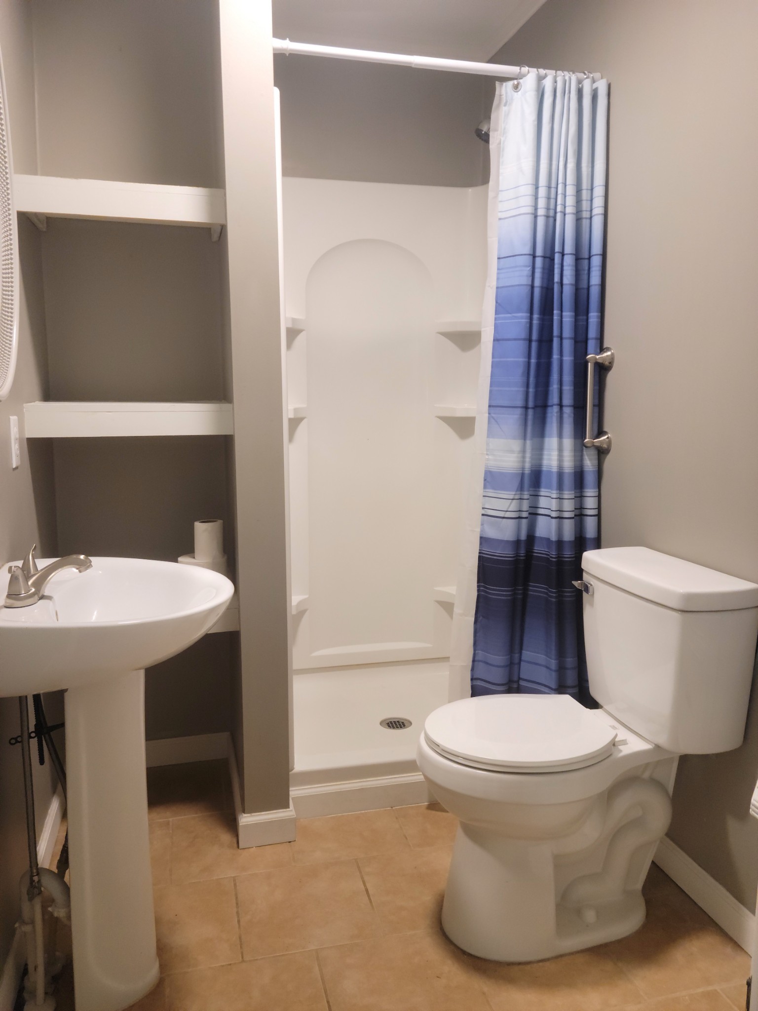 4666 Talley Road Springfield, TN 37172 - Photo 11 of 12 a bathroom with a sink toilet and shower