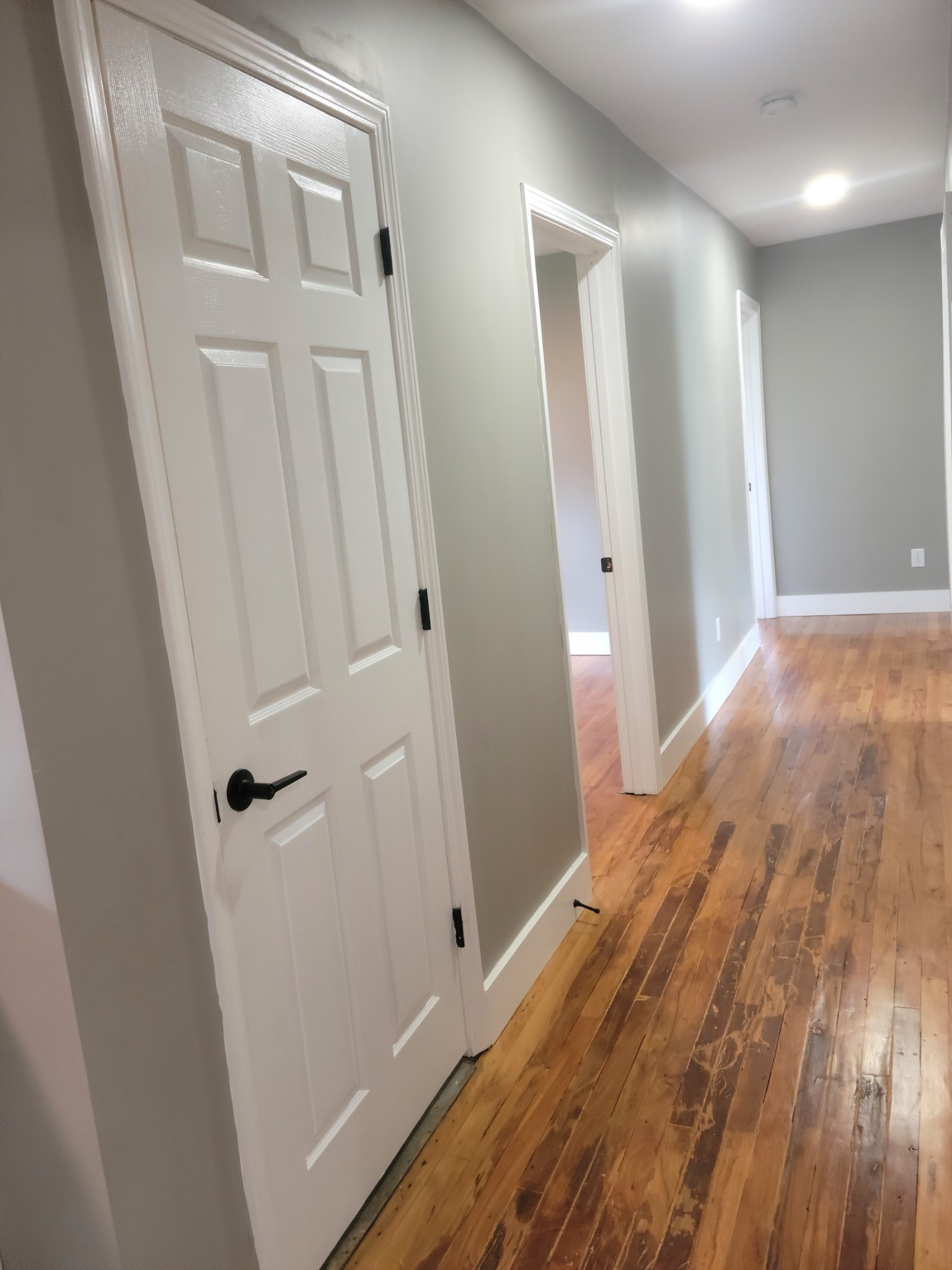 4666 Talley Road Springfield, TN 37172 - Photo 7 of 12 a view of a hallway with wooden floor and staircase