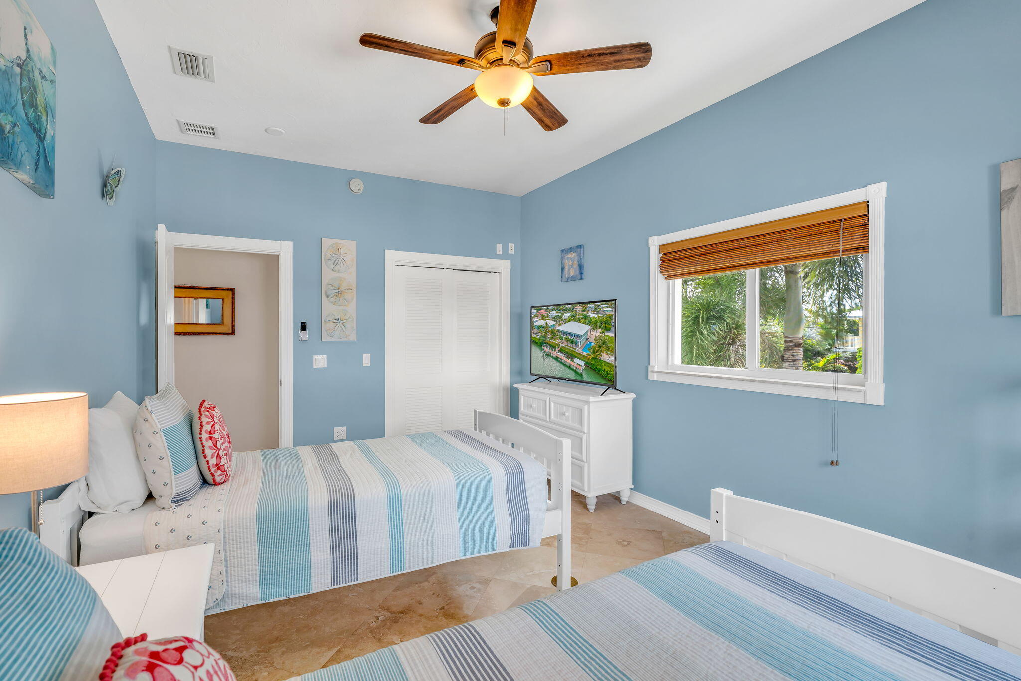 151 Ave G Marathon, FL 33050 - Photo 13 of 56 a bedroom with a bed and window