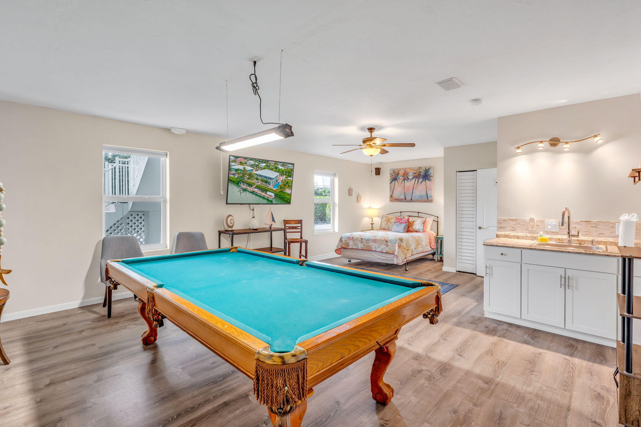 151 Ave G Marathon, FL 33050 - Photo 20 of 56 a room with pool table and windows