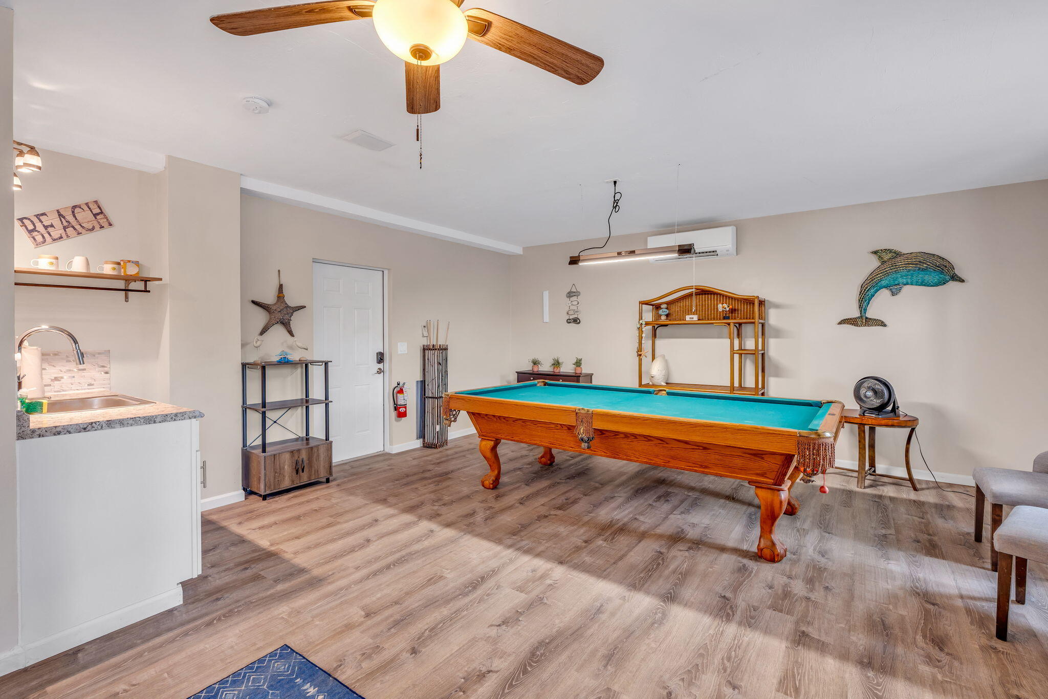 151 Ave G Marathon, FL 33050 - Photo 23 of 56 a room with wooden floors and pool table