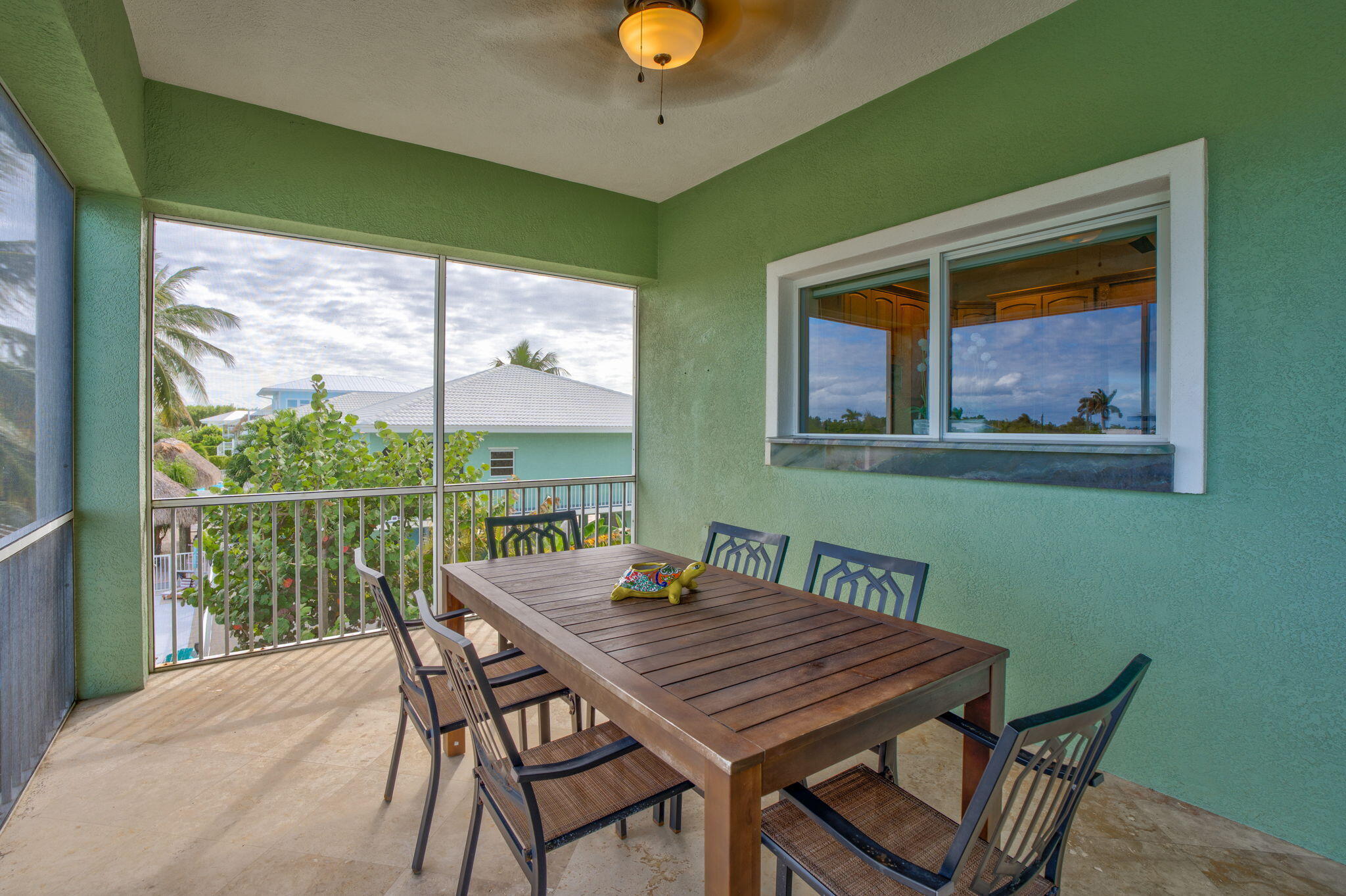 151 Ave G Marathon, FL 33050 - Photo 33 of 56 a view of a dining room with furniture window and outside view