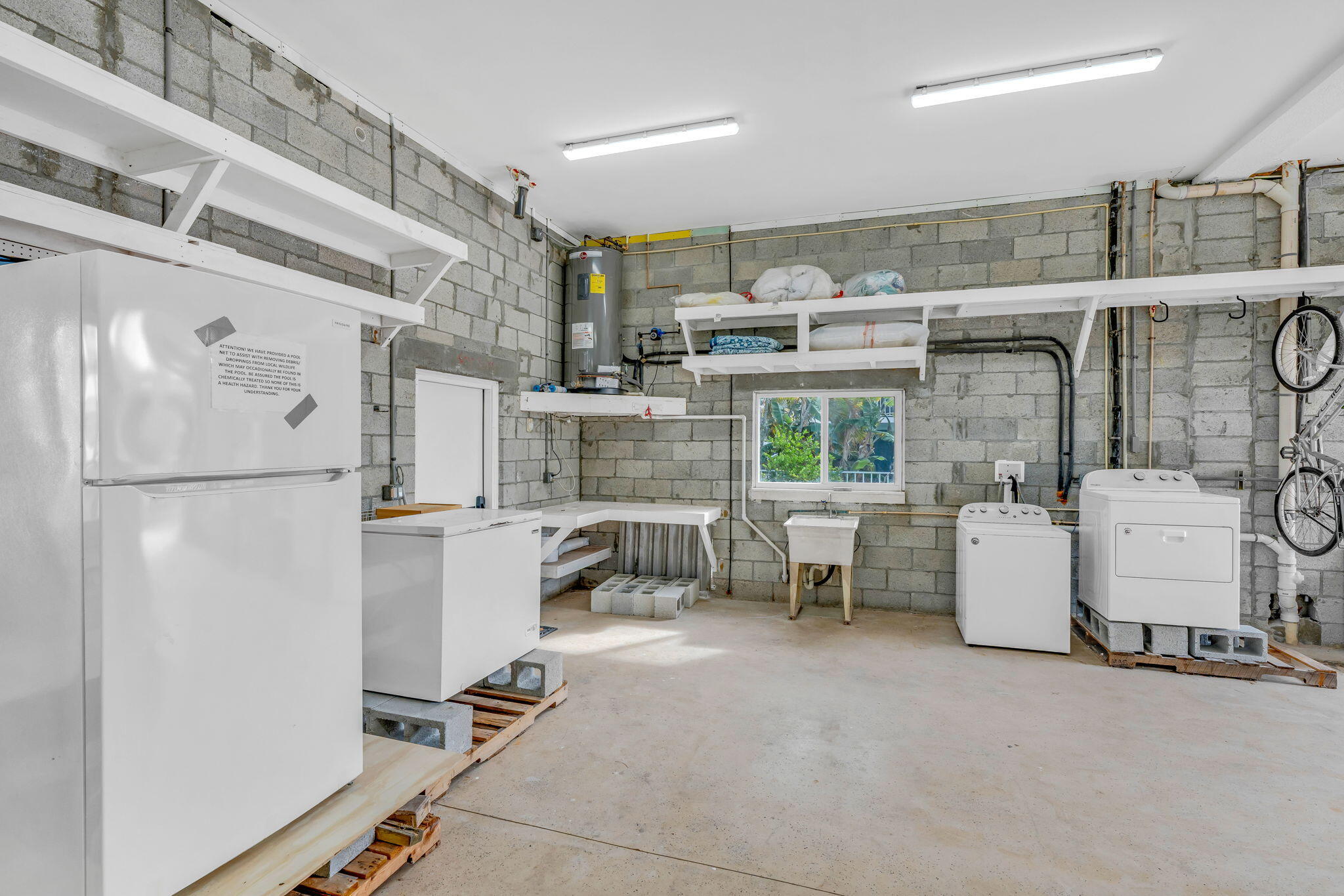 151 Ave G Marathon, FL 33050 - Photo 36 of 56 a storage room with washer and dryer