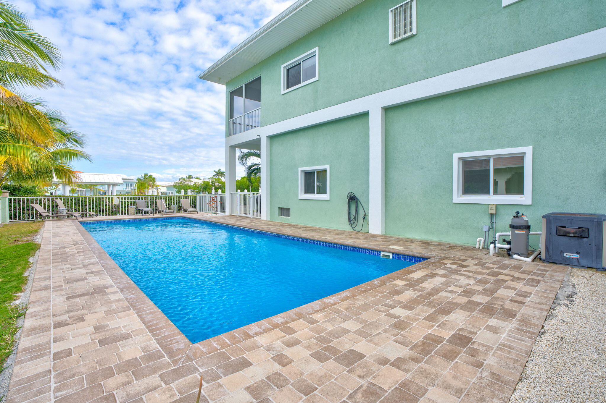 151 Ave G Marathon, FL 33050 - Photo 39 of 56 a view of a backyard with swimming pool