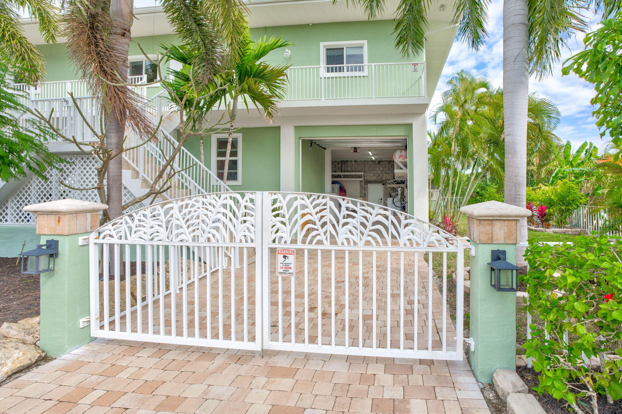 151 Ave G Marathon, FL 33050 - Photo 47 of 56 a front view of a house with a garden