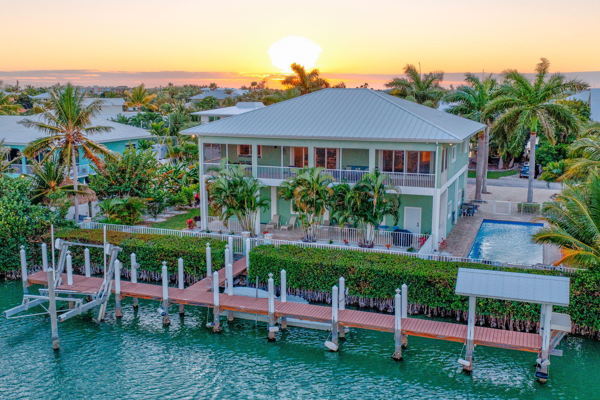 151 Ave G Marathon, FL 33050 - Photo 53 of 56 a front view of a house with a yard table and chairs