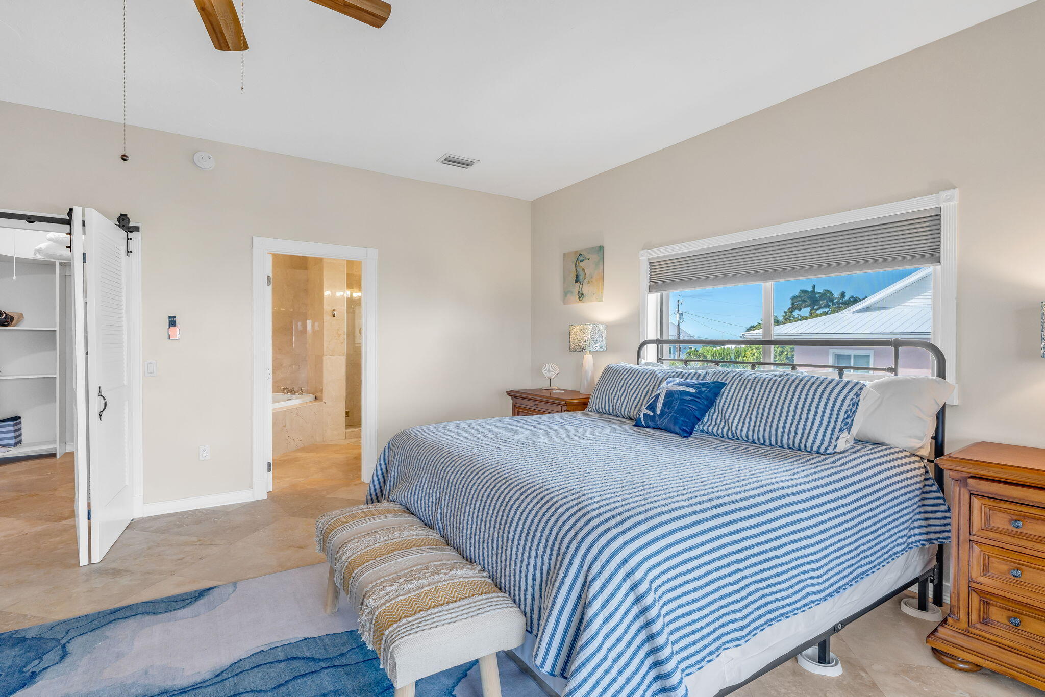 151 Ave G Marathon, FL 33050 - Photo 9 of 56 a bedroom with a bed and a couch