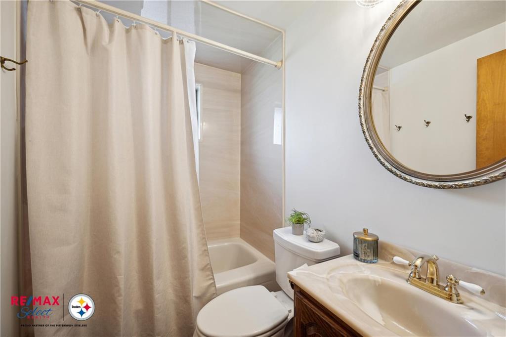 132 Shafer Road Coraopolis, PA 15108 - Photo 17 of 39 a bathroom with a sink and a mirror
