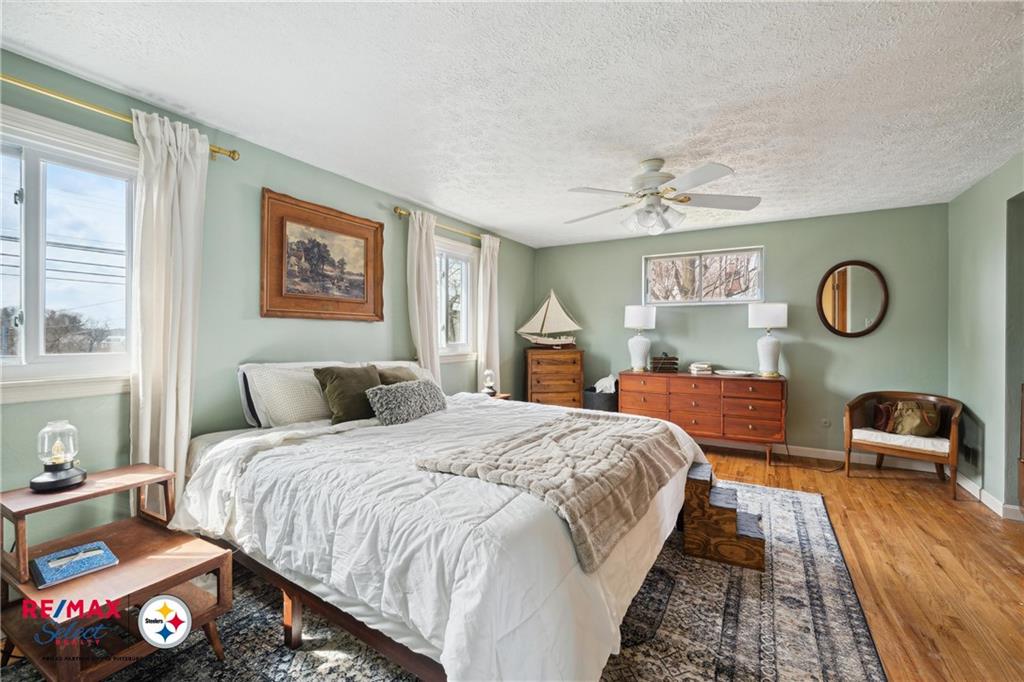 132 Shafer Road Coraopolis, PA 15108 - Photo 20 of 39 a bedroom with a bed and a dresser next to a window