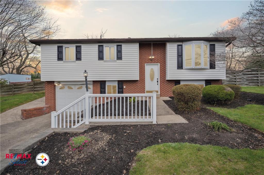 132 Shafer Road Coraopolis, PA 15108 - Photo 2 of 39 a front view of a house with garden
