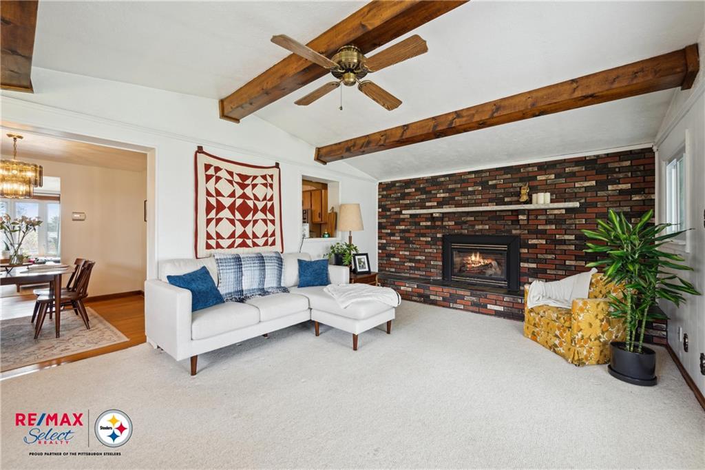 132 Shafer Road Coraopolis, PA 15108 - Photo 24 of 39 a living room with furniture and a fireplace