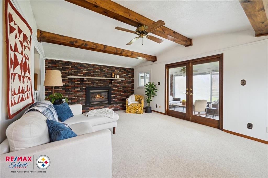 132 Shafer Road Coraopolis, PA 15108 - Photo 25 of 39 a living room with furniture and a fireplace