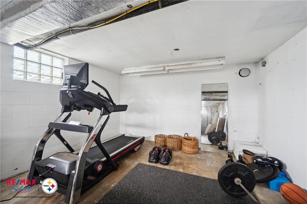 132 Shafer Road Coraopolis, PA 15108 - Photo 34 of 39 a room with gym equipment and windows