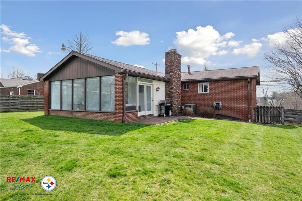 132 Shafer Road Coraopolis, PA 15108 - Photo 38 of 39 a backyard of a house with table and chairs