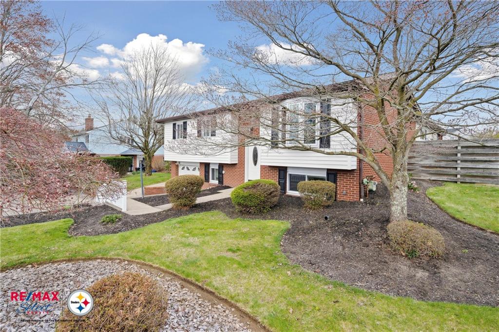 132 Shafer Road Coraopolis, PA 15108 - Photo 4 of 39 a view of a house with a yard