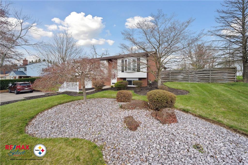 132 Shafer Road Coraopolis, PA 15108 - Photo 5 of 39 a backyard of a house with lots of green space