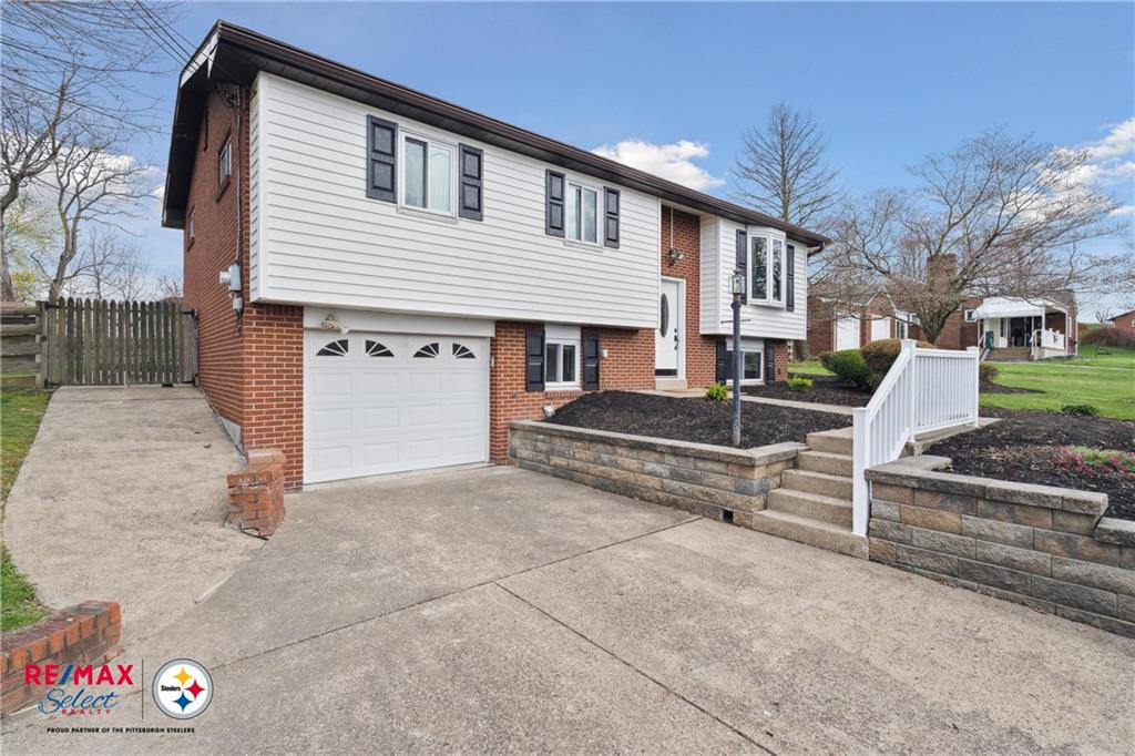 132 Shafer Road Coraopolis, PA 15108 - Photo 6 of 39 a view of a chairs and tables in the back yard of the house